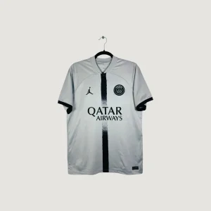 Paris - MAILLOT EXTÉRIEUR 22/23 - BLANC, NOIR